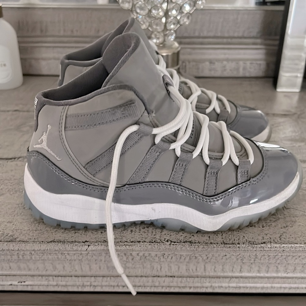 Cool Grey Jordan’s- Little Kids size 1. Only worn a few times. Outgrew too fast.